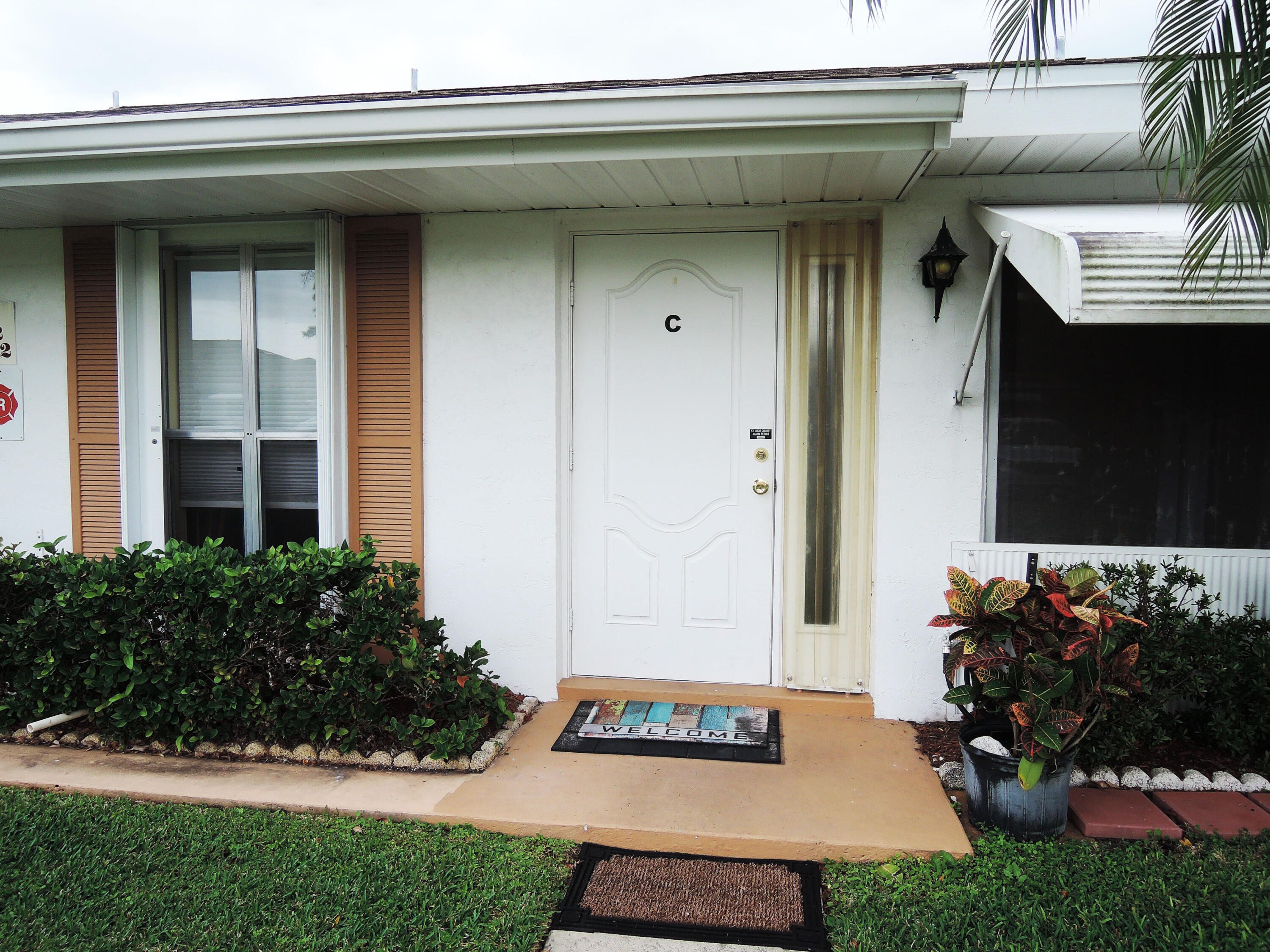 322 Colony Lane, Unit C Fort Pierce, FL 34982 - Photo 2 of 25 Front Entrance
