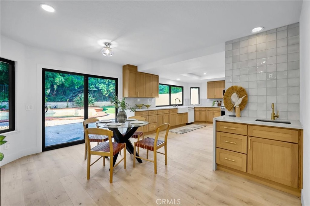 21029 Stoddard Wells Road Walnut, CA 91789 - Photo 14 of 34 a view of a kitchen and dining room