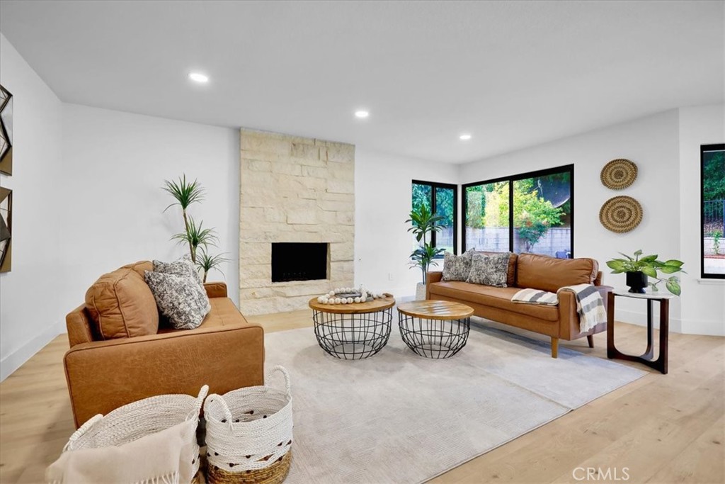 21029 Stoddard Wells Road Walnut, CA 91789 - Photo 15 of 34 a living room with furniture and a large window