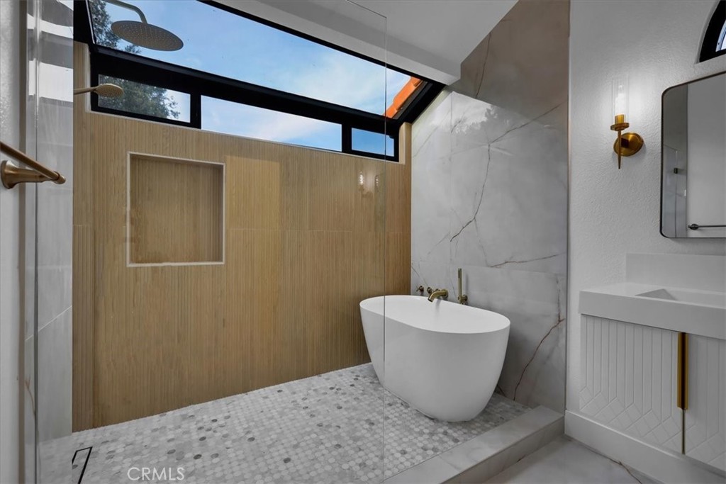 21029 Stoddard Wells Road Walnut, CA 91789 - Photo 29 of 34 a bathroom with a sink and a mirror