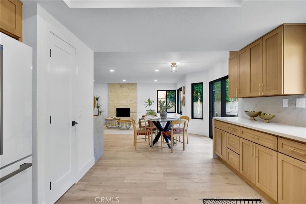 21029 Stoddard Wells Road Walnut, CA 91789 - Photo 10 of 34 a view of a kitchen and dining room