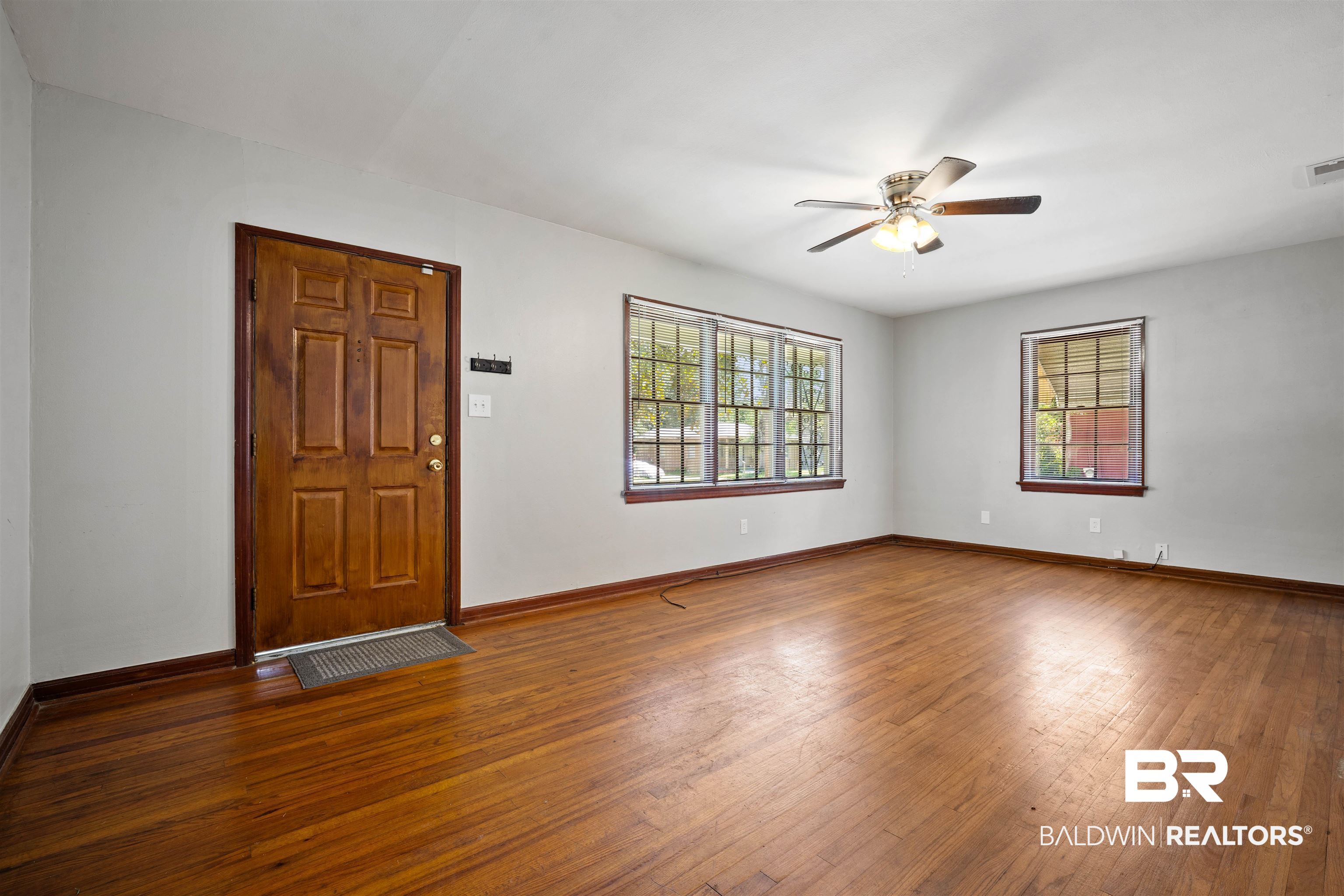 9 Elizabeth Avenue Mobile, AL 36611 - Photo 4 of 19 Spare room with ceiling fan and hardwood / wood-style floors