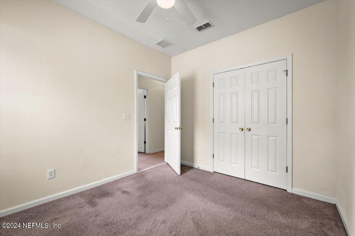 1953 Benedict Road Jacksonville, FL 32209 - Photo 17 of 23 an empty room with closet area