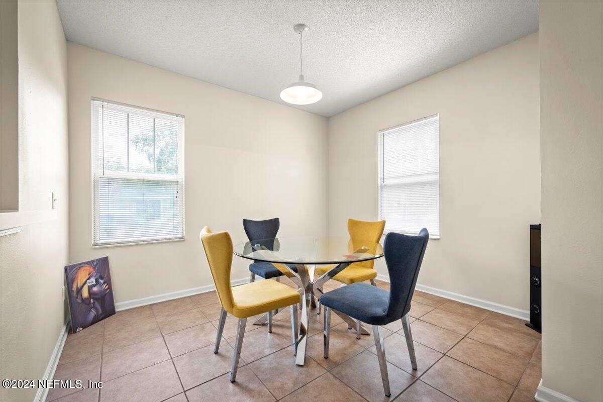 1953 Benedict Road Jacksonville, FL 32209 - Photo 7 of 23 a view of a dining room with furniture and window