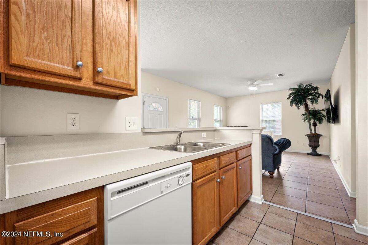1953 Benedict Road Jacksonville, FL 32209 - Photo 9 of 23 a kitchen with a sink and cabinets