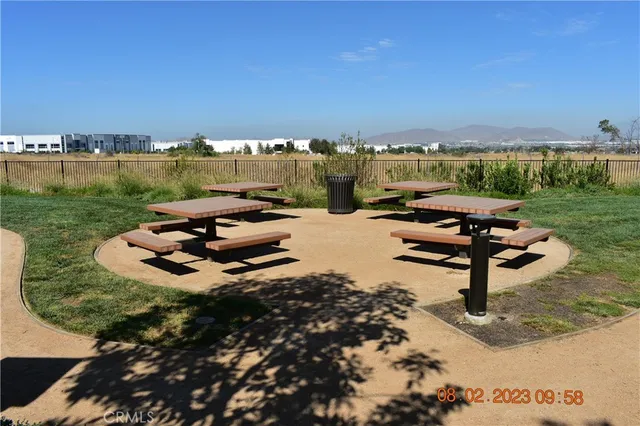a view of a town with mountains in the background