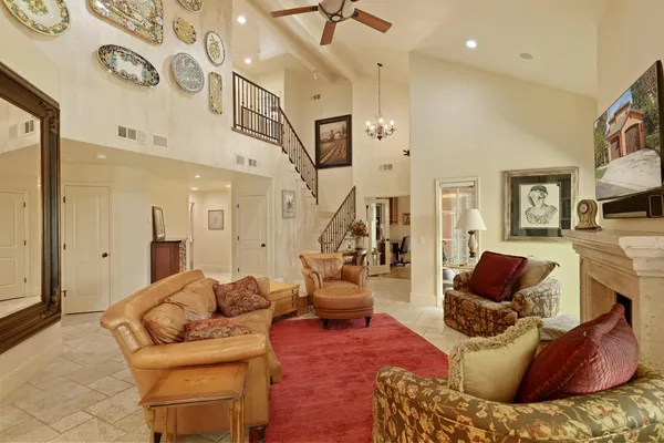 a dining room with furniture and window