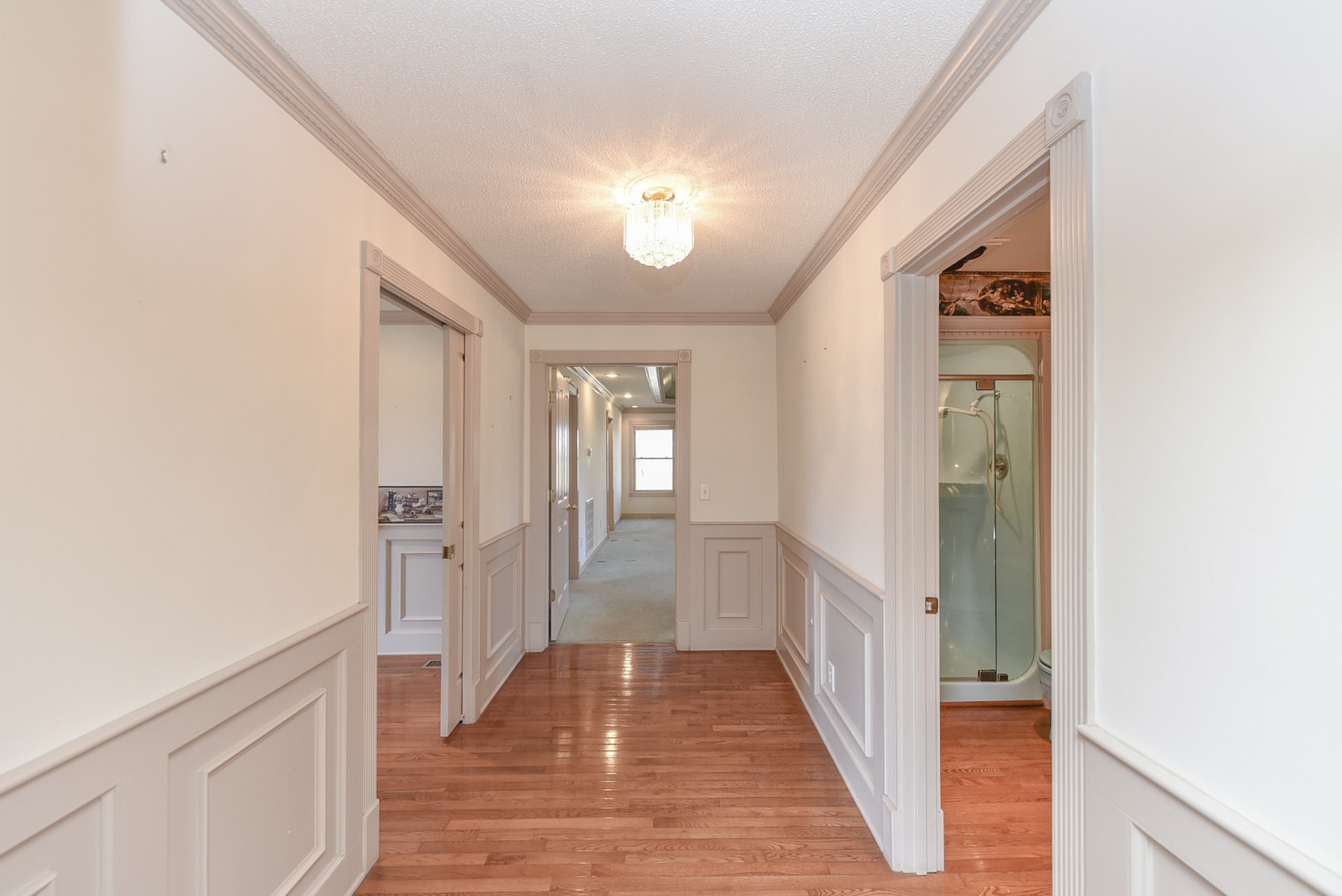 450 Bell Road Gallatin, TN 37066 - Photo 15 of 45 a view of a hallway with wooden floor and staircase