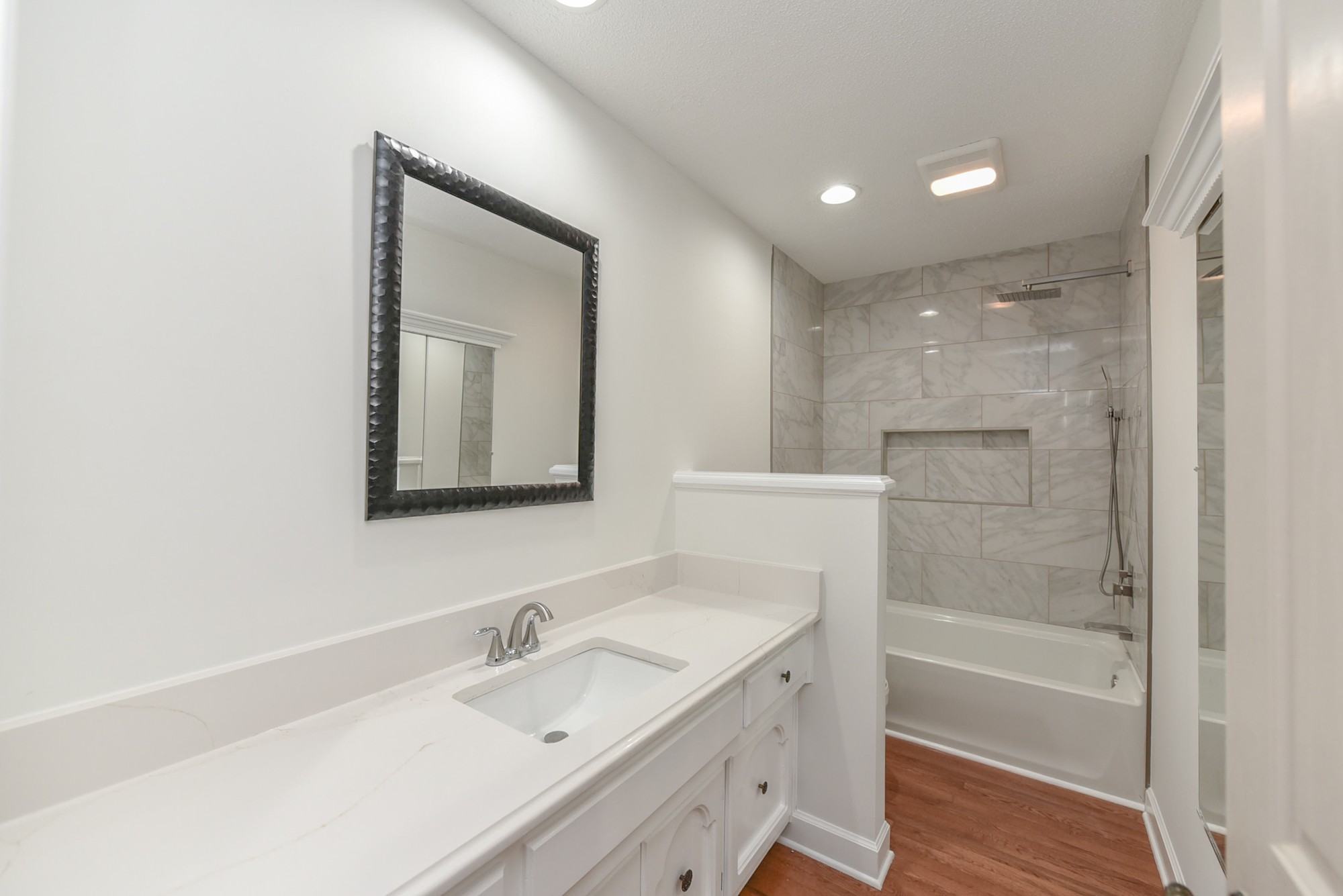 450 Bell Road Gallatin, TN 37066 - Photo 22 of 45 a bathroom with a bathtub shower sink and mirror