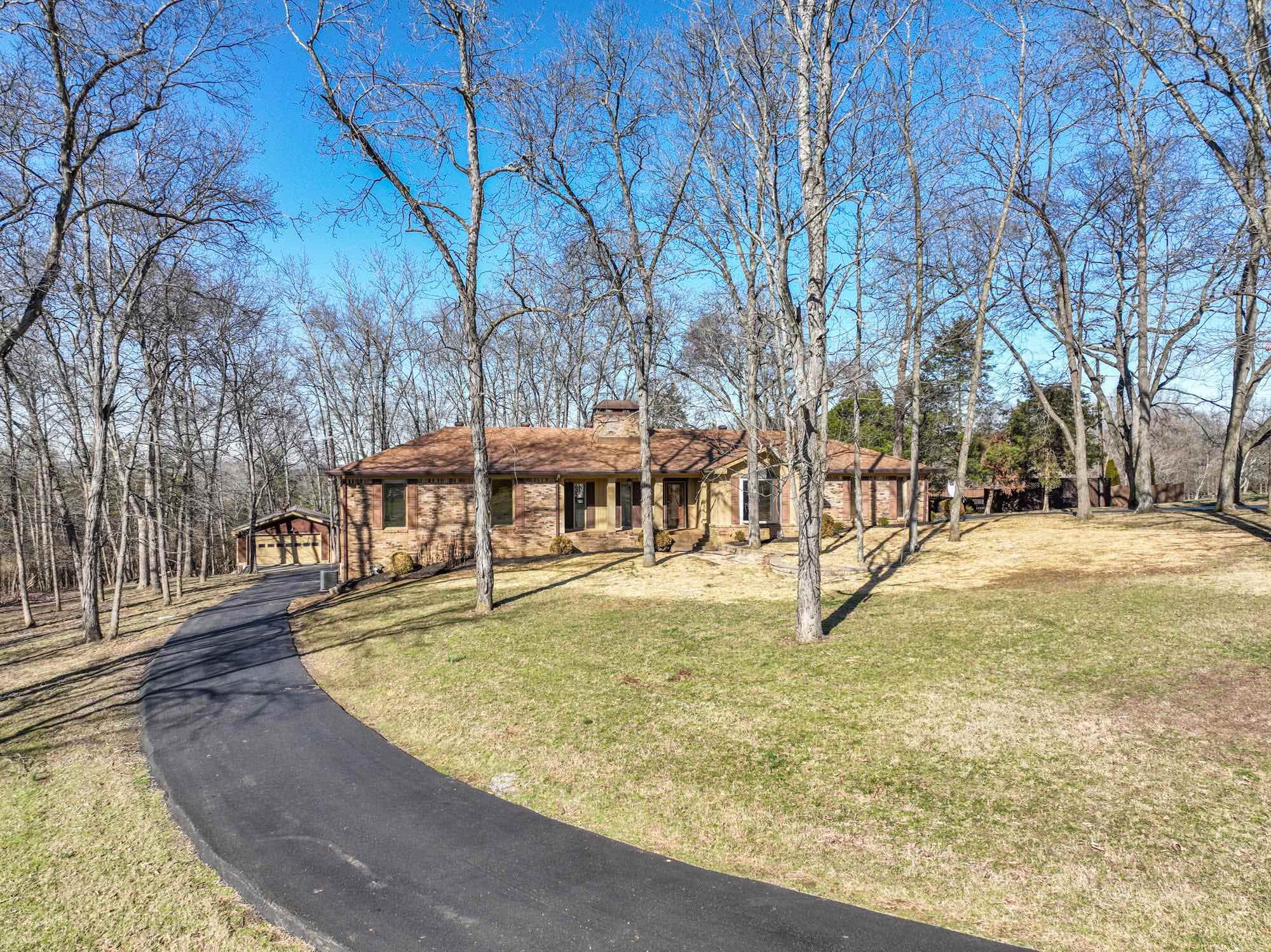 450 Bell Road Gallatin, TN 37066 - Photo 35 of 45 a view of yard with swimming pool and sitting area