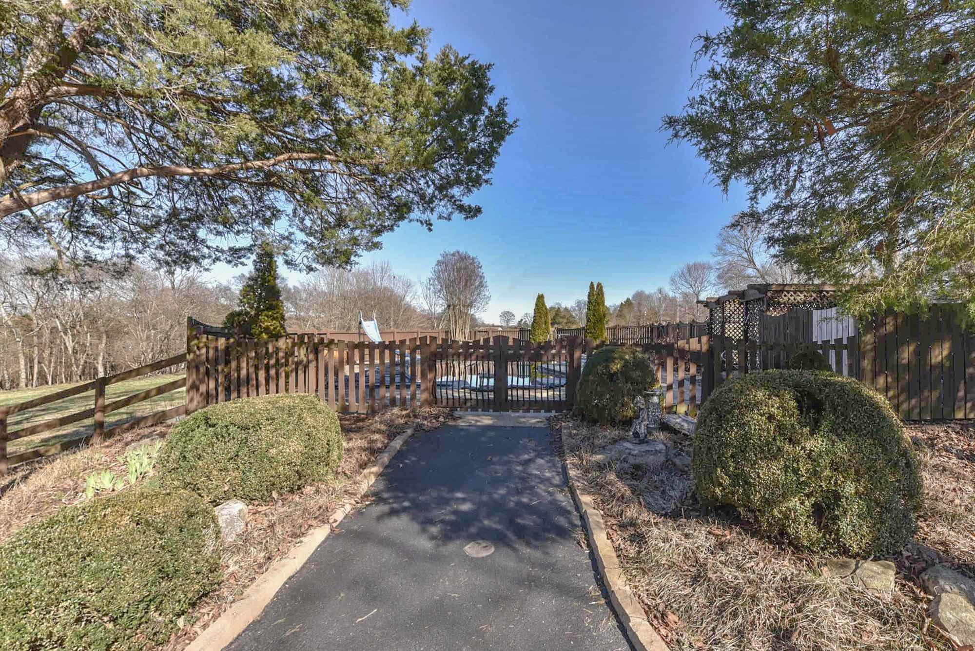 450 Bell Road Gallatin, TN 37066 - Photo 39 of 45 a view of a pathway with a wrought fence