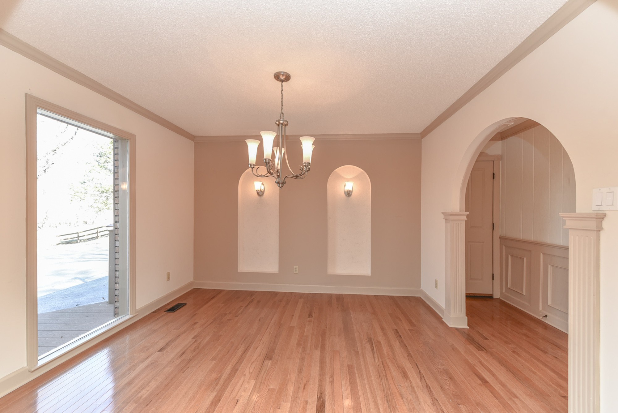 450 Bell Road Gallatin, TN 37066 - Photo 9 of 45 a view of empty room with wooden floor and fan