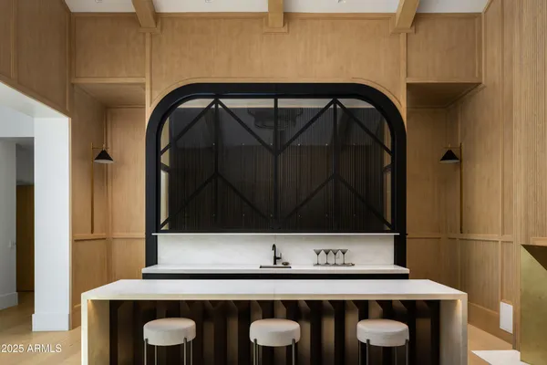 a bathroom with a tub and shower