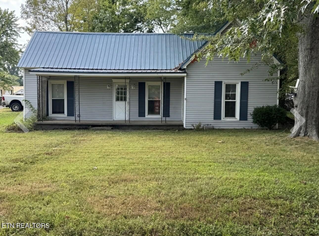 a view of a house with a garden