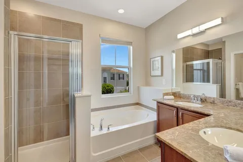 a bathroom with a shower and toilet