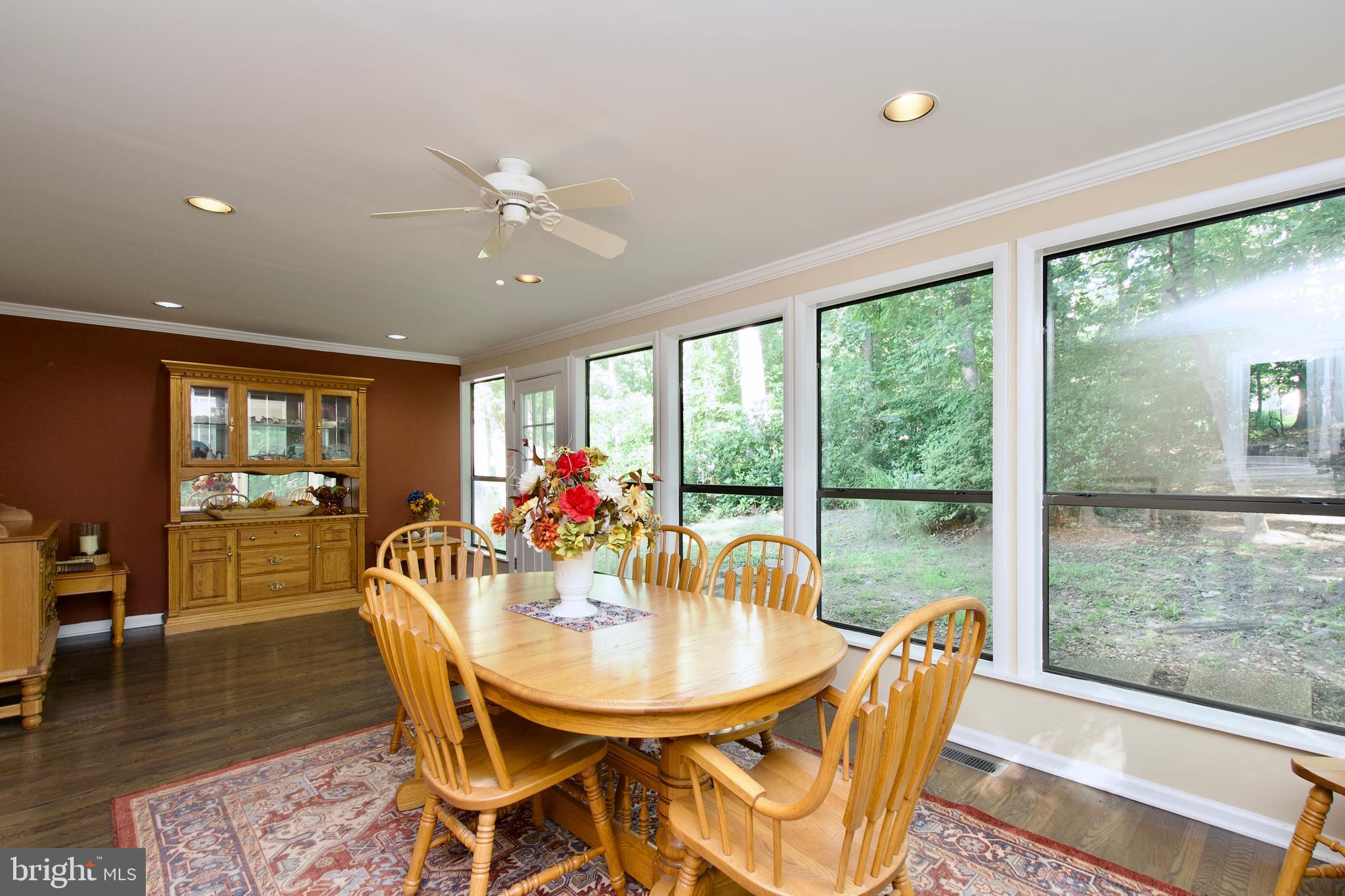 703 Gold Valley Road Locust Grove, VA 22508 - Photo 7 of 10 a dining room with furniture window and wooden floor