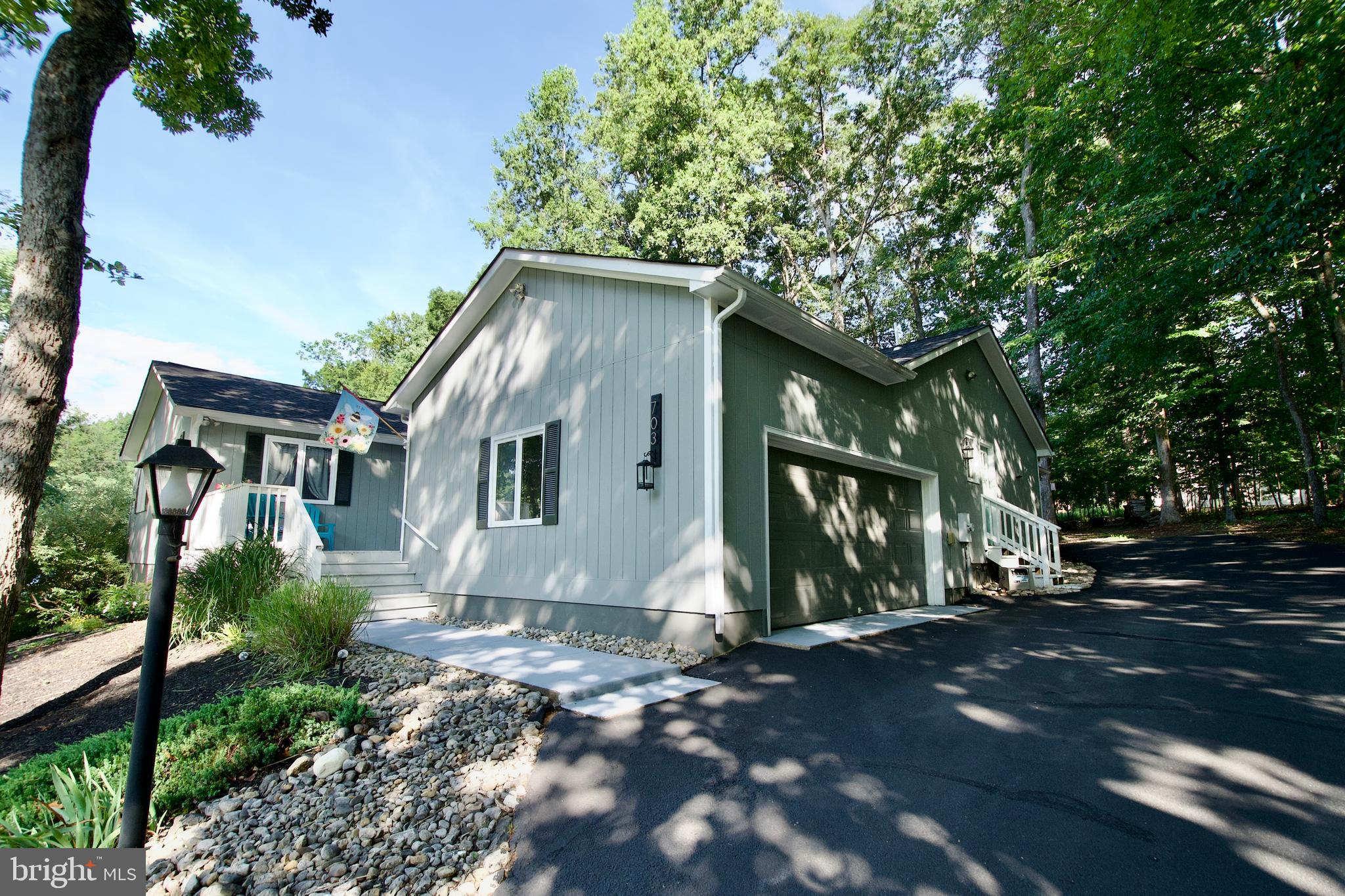 703 Gold Valley Road Locust Grove, VA 22508 - Photo 9 of 10 a front view of a house with a yard
