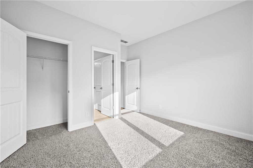 2770 Longacre Park Way Lawrenceville, GA 30044 - Photo 22 of 52 a view of an empty room