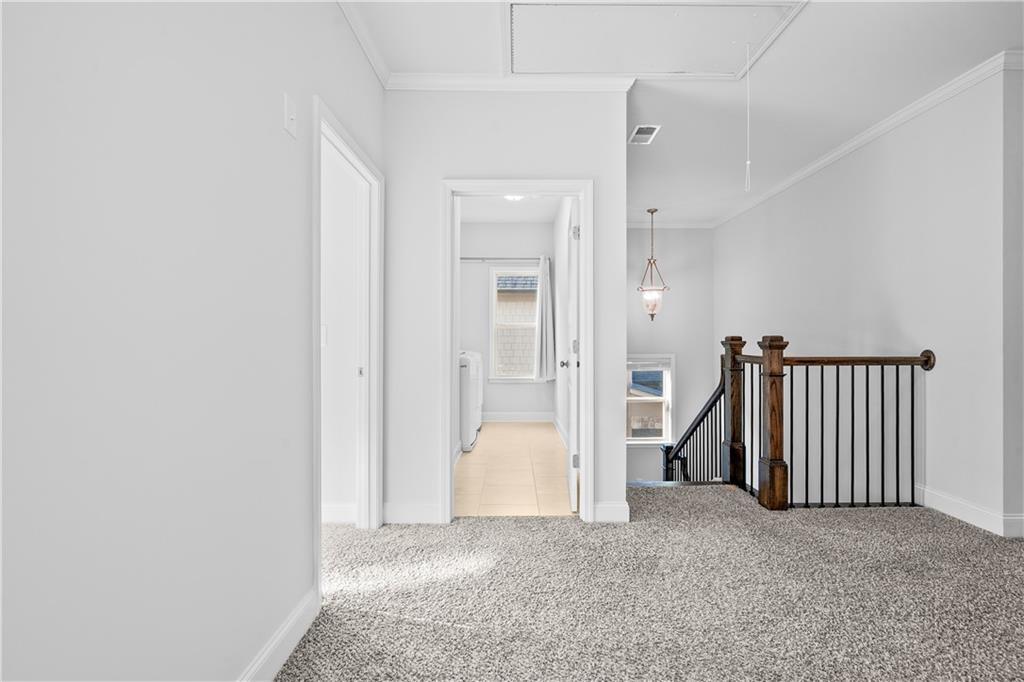 2770 Longacre Park Way Lawrenceville, GA 30044 - Photo 26 of 52 a view of a room with walk in closet and bedroom