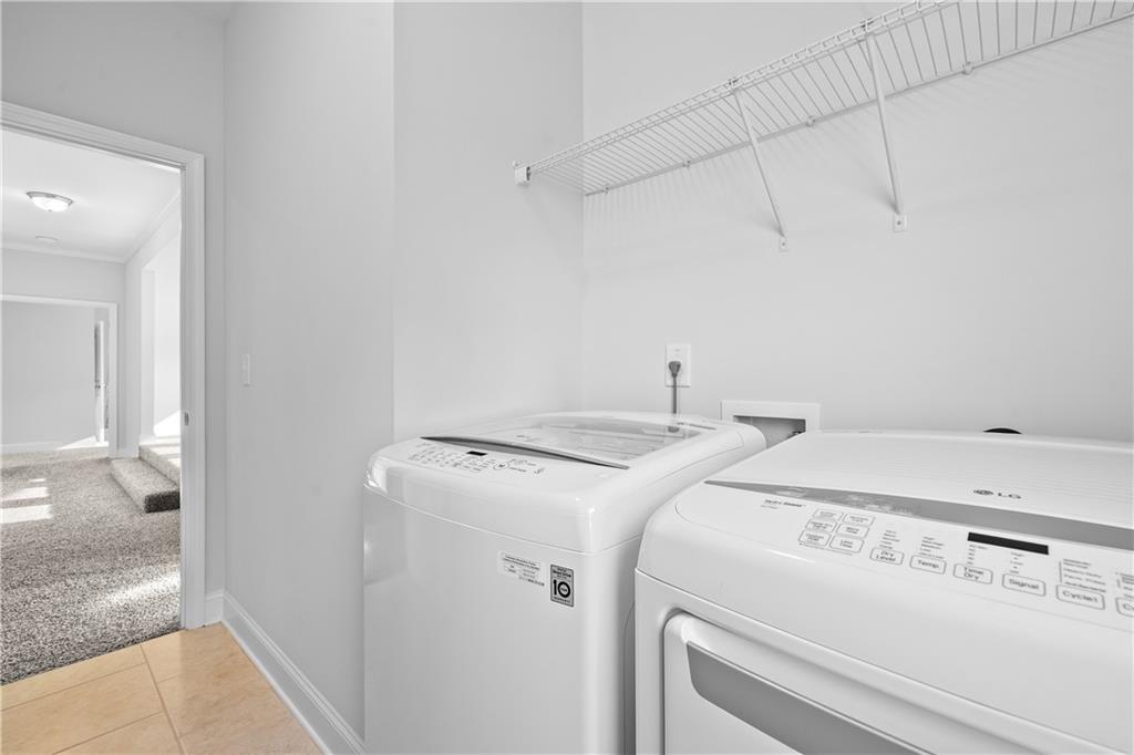 2770 Longacre Park Way Lawrenceville, GA 30044 - Photo 27 of 52 a utility room with dryer and washer