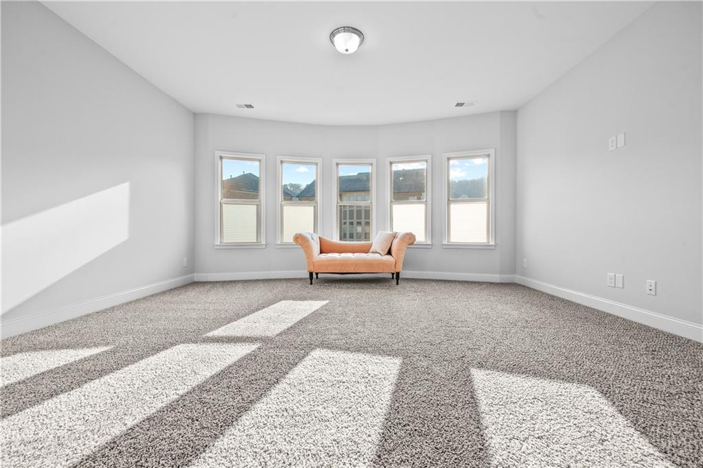 2770 Longacre Park Way Lawrenceville, GA 30044 - Photo 28 of 52 a living room with a couch