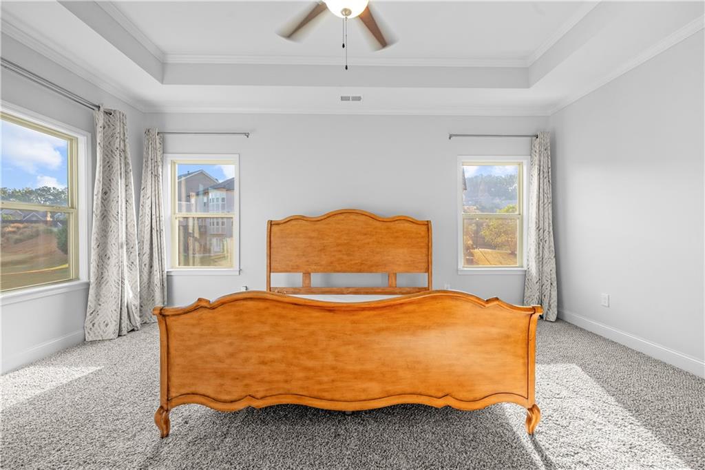 2770 Longacre Park Way Lawrenceville, GA 30044 - Photo 31 of 52 a bedroom with a bed and window