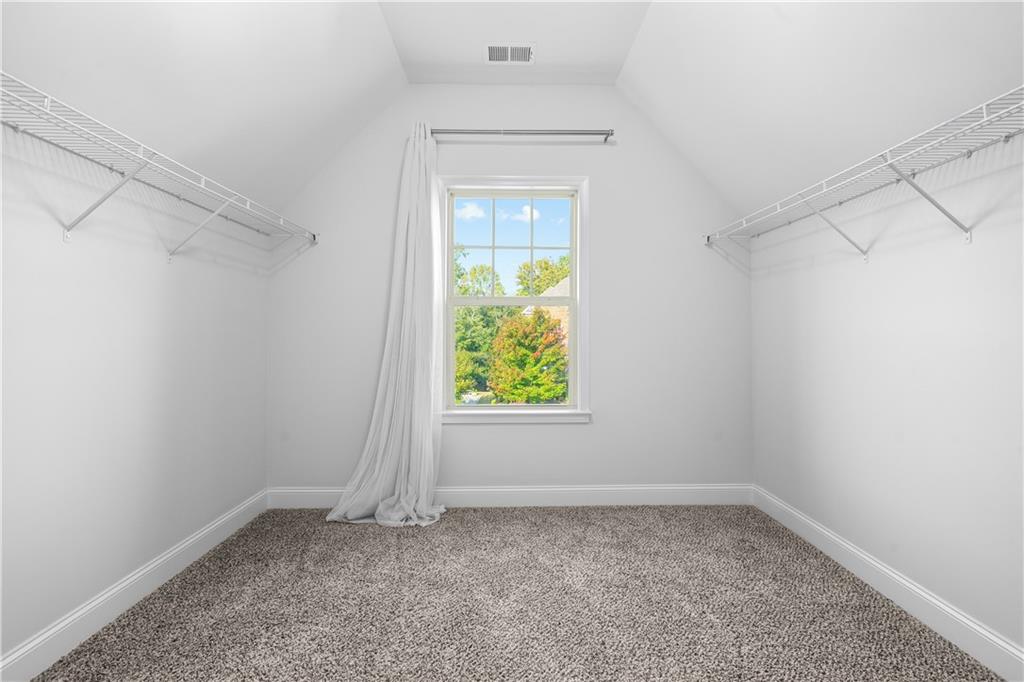 2770 Longacre Park Way Lawrenceville, GA 30044 - Photo 39 of 52 an empty room with a window