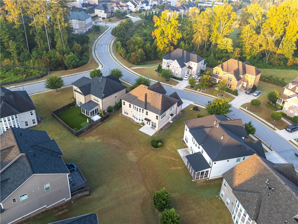 2770 Longacre Park Way Lawrenceville, GA 30044 - Photo 48 of 52 an aerial view of a house with swimming pool and outdoor seating