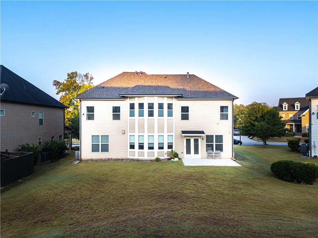 2770 Longacre Park Way Lawrenceville, GA 30044 - Photo 49 of 52 a front view of a house with garden