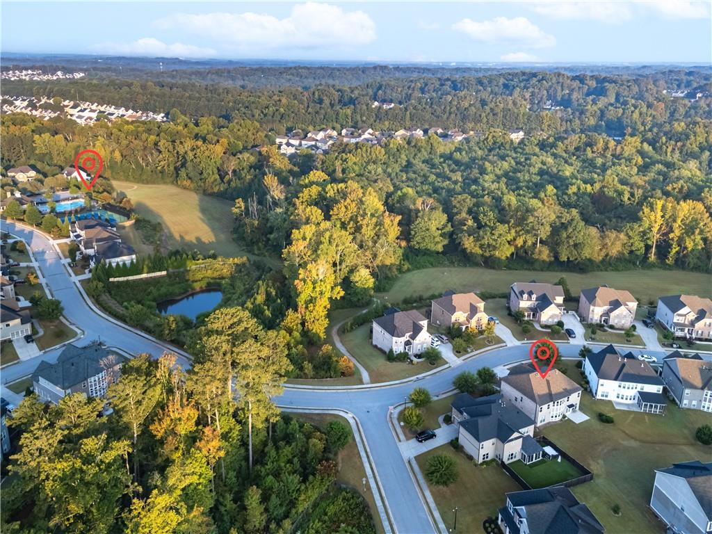 2770 Longacre Park Way Lawrenceville, GA 30044 - Photo 52 of 52 an aerial view of residential house with outdoor space and lake view