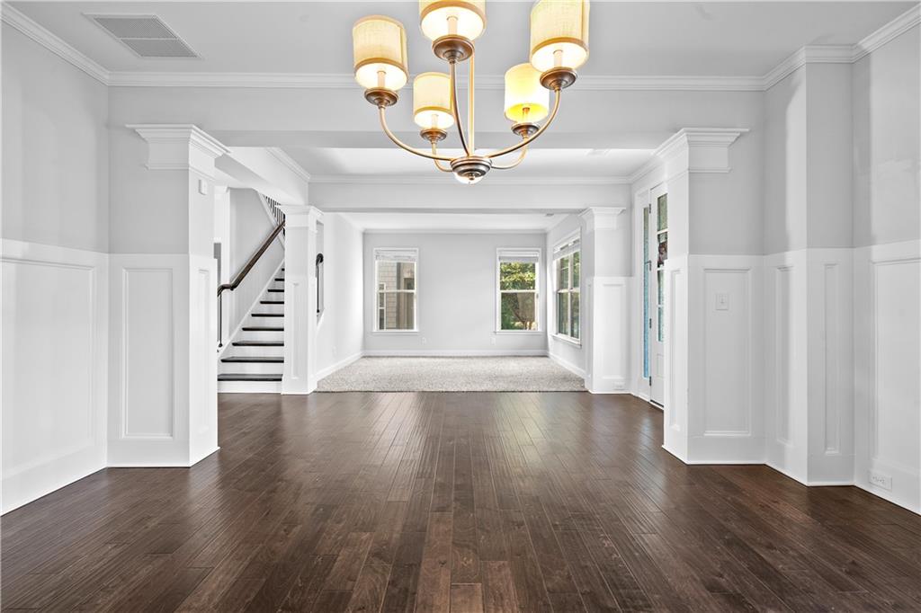 2770 Longacre Park Way Lawrenceville, GA 30044 - Photo 9 of 52 a view of an entryway with wooden floor