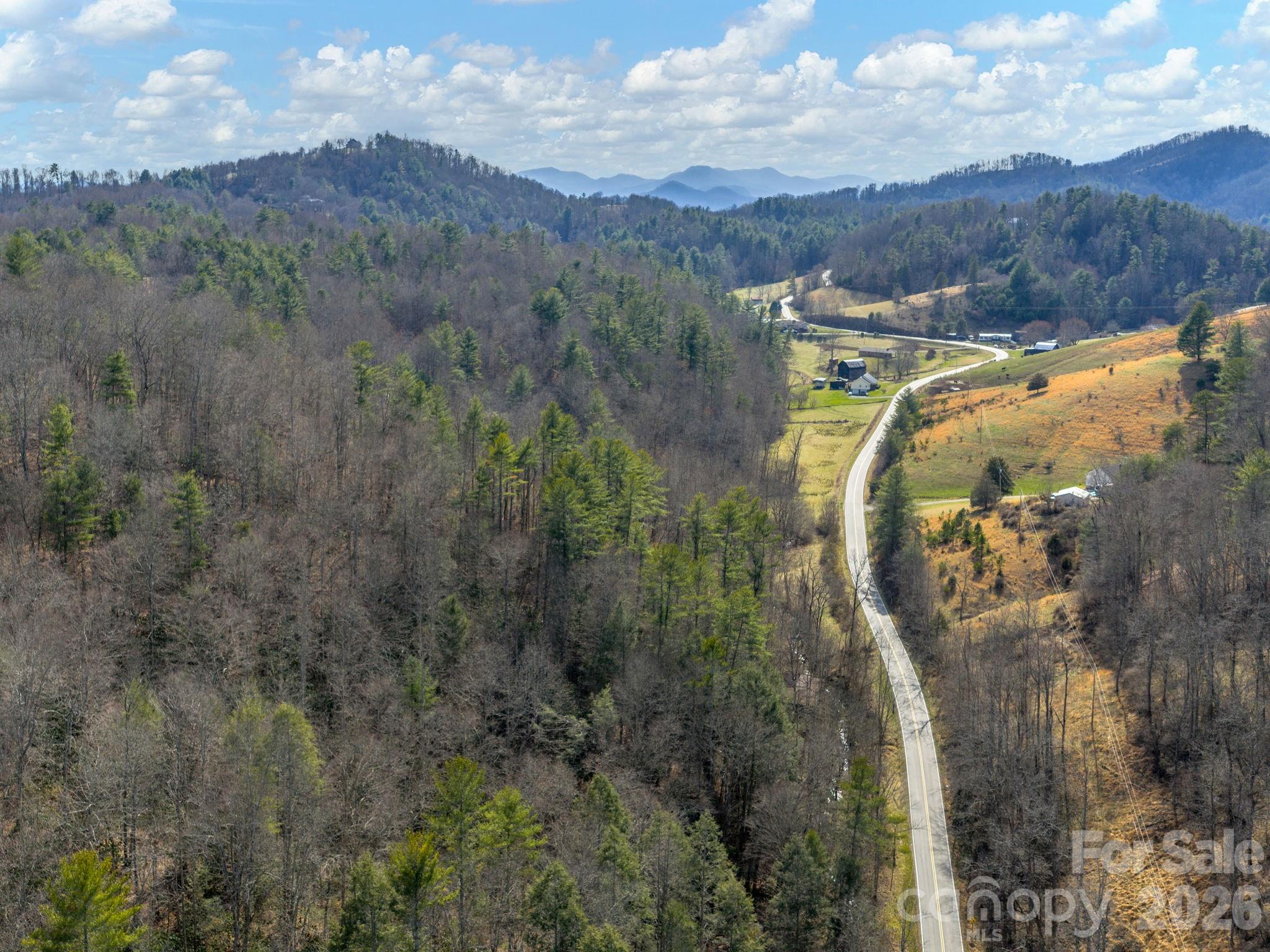99999 Baileys Branch Road Marshall, NC 28753 - Photo 2 of 10 a view of a pathway of a building