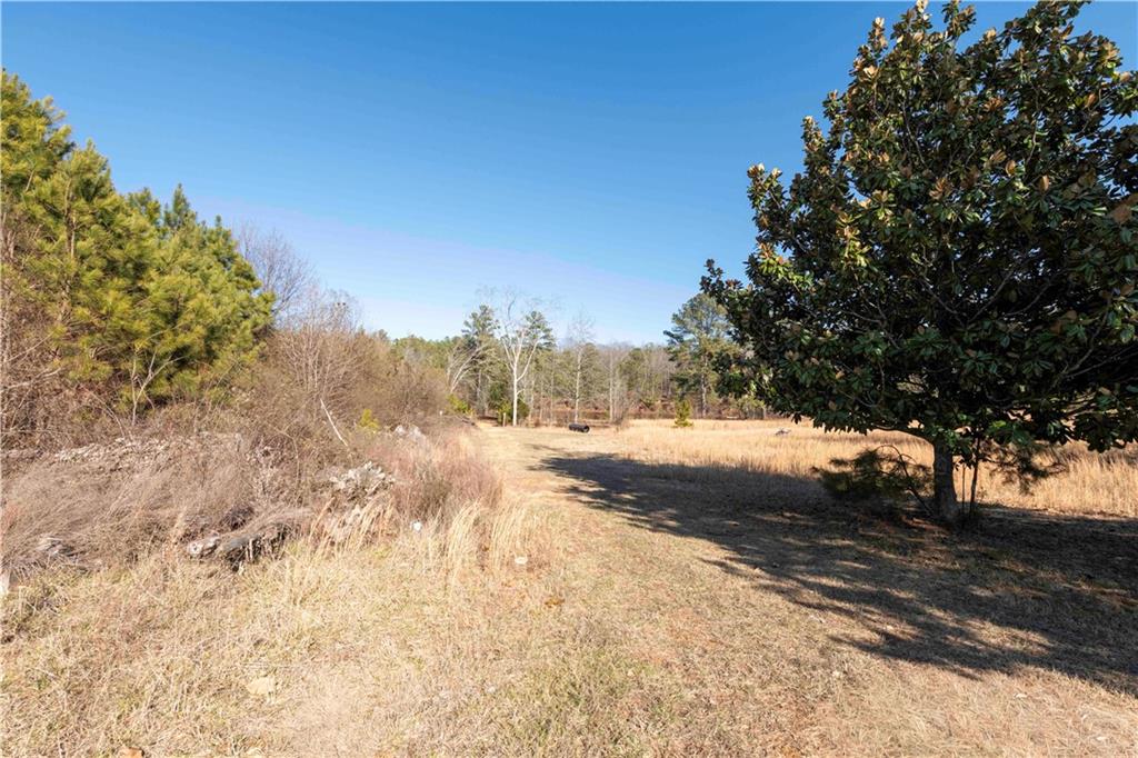 0 Sam Sutton Road Northwest Adairsville, GA 30103 - Photo 6 of 14 a view of snow on the road