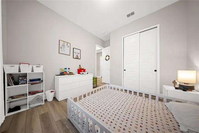 a kitchen with stainless steel appliances a stove top oven and cabinets