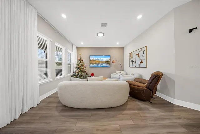 a spacious bathroom with a toilet sink and shower