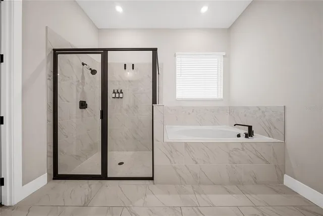 a view of a house with outdoor space and sitting area