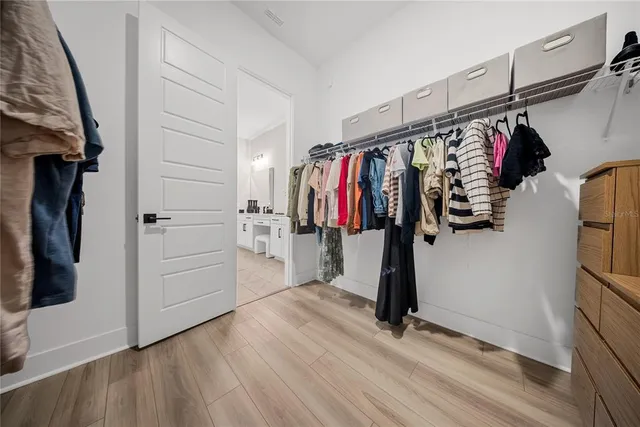 a view of a swimming pool with outdoor seating