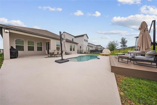 an aerial view of residential building and ocean