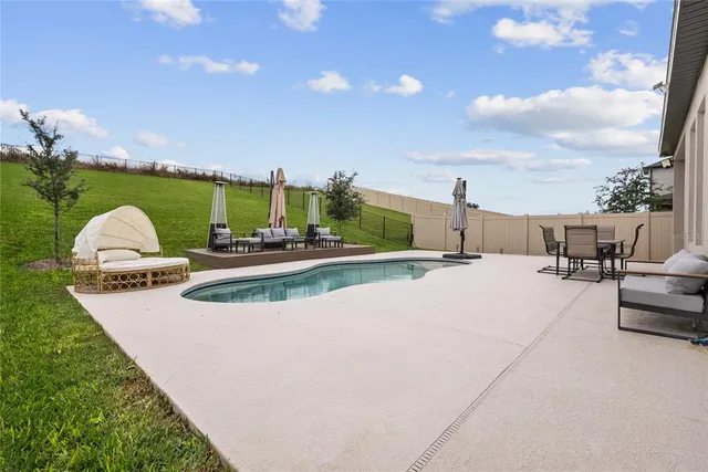 an aerial view of residential building and ocean