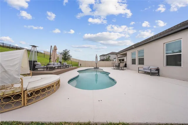 a picture of a bathroom with mirror gate and outdoor seating