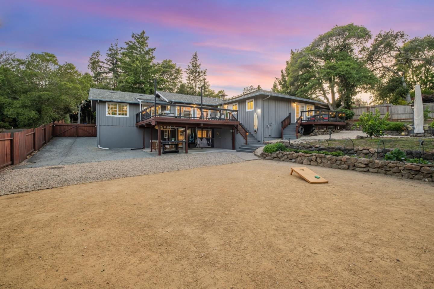 770 Graham Hill Road Santa Cruz, CA 95060 - Photo 5 of 83 a view of a house with a yard and sitting area