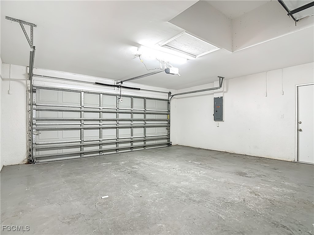 4034 29th Street Southwest Lehigh Acres, FL 33976 - Photo 20 of 22 a view of a garage