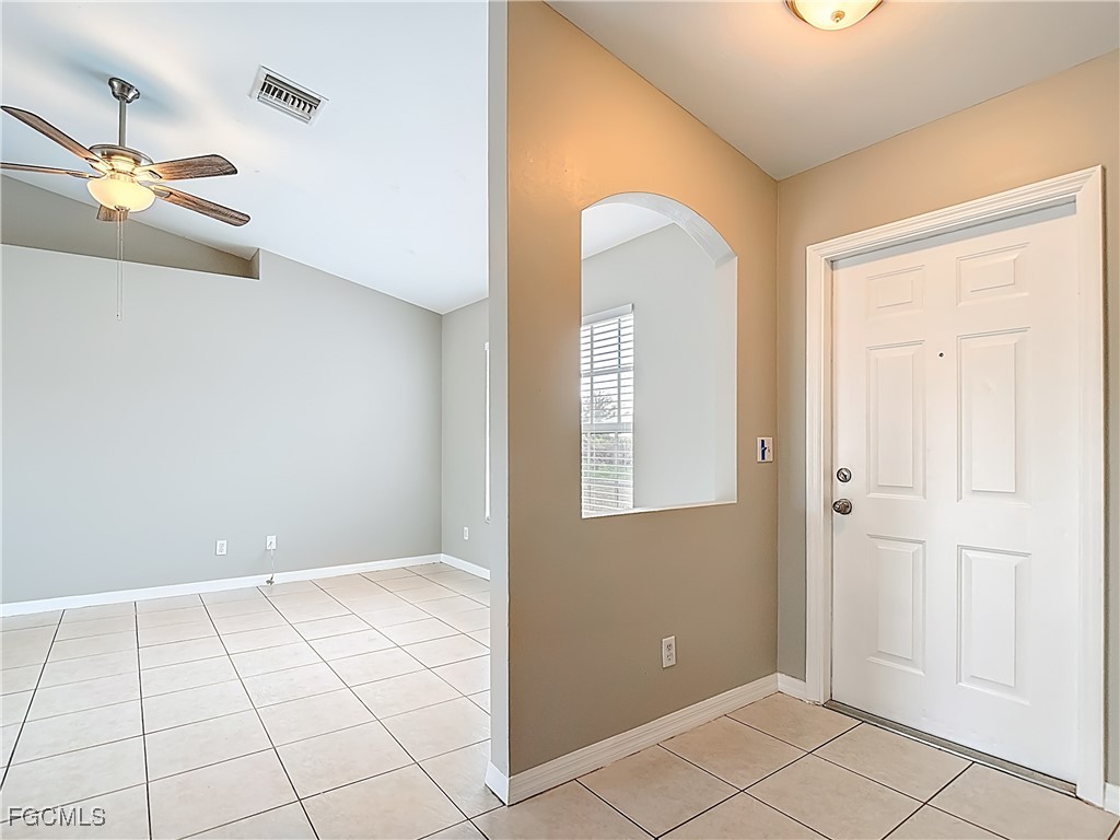 4034 29th Street Southwest Lehigh Acres, FL 33976 - Photo 3 of 22 an empty room with windows and closet