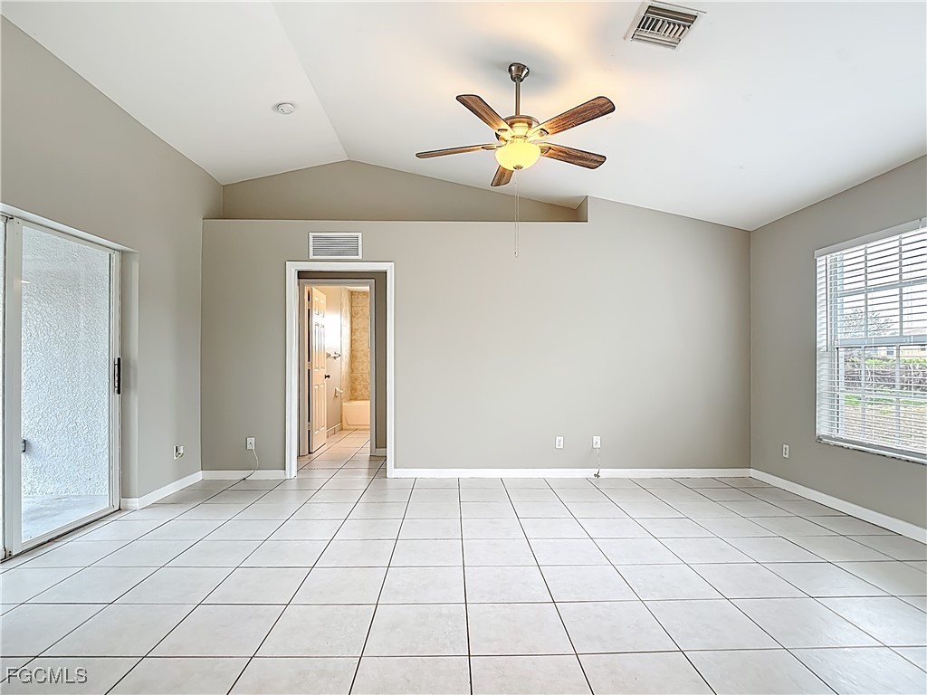 4034 29th Street Southwest Lehigh Acres, FL 33976 - Photo 4 of 22 a view of an empty room and window