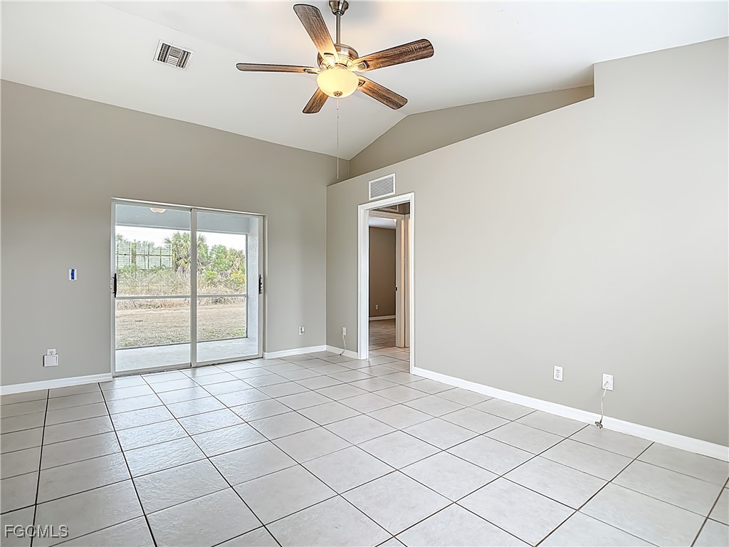 4034 29th Street Southwest Lehigh Acres, FL 33976 - Photo 5 of 22 a view of an empty room and window