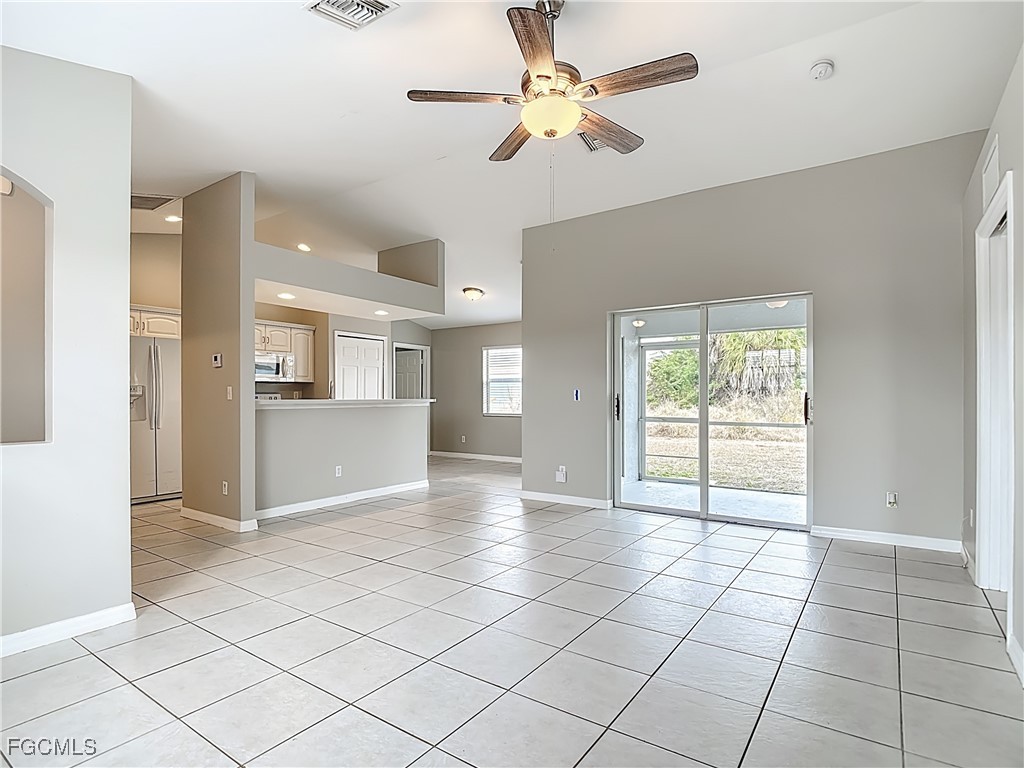 4034 29th Street Southwest Lehigh Acres, FL 33976 - Photo 6 of 22 a view of an empty room with a window