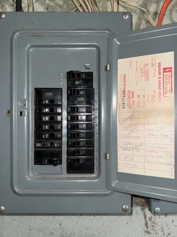 a kitchen with a stove and cabinets