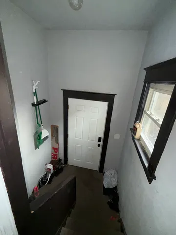 a bathroom with a toilet and a sink