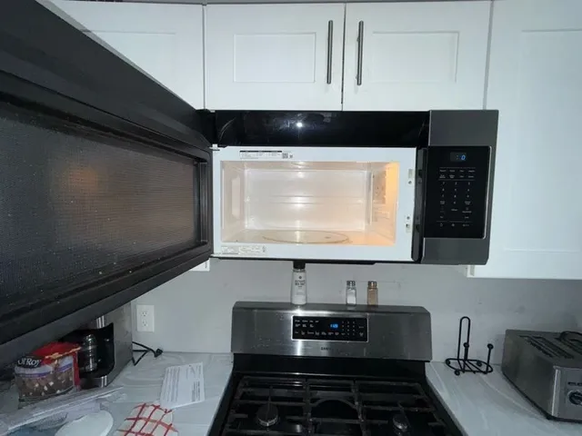 a room with furniture and a flat screen tv