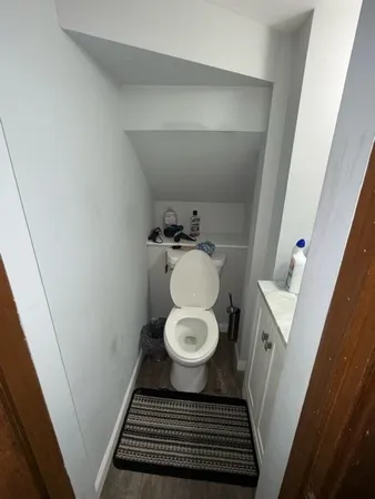 a bathroom with a bathtub and a sink